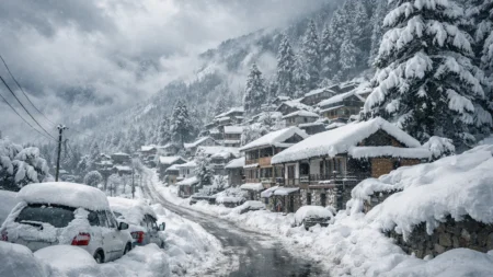 Snow-covered houses and roads after heavy snowfall in Himachal Pradesh hill districts.