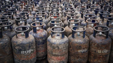 Commercial LPG cylinders stacked at a gas agency during supply shortage