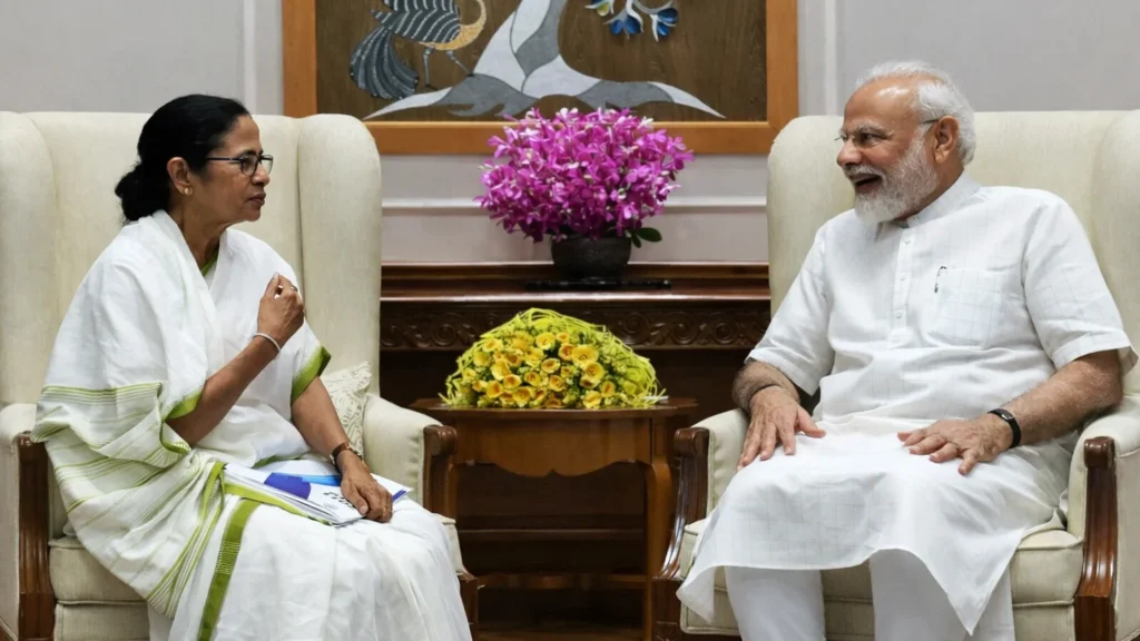 Prime Minister Narendra Modi and West Bengal Chief Minister Mamata Banerjee speaking during a meeting in New Delhi.