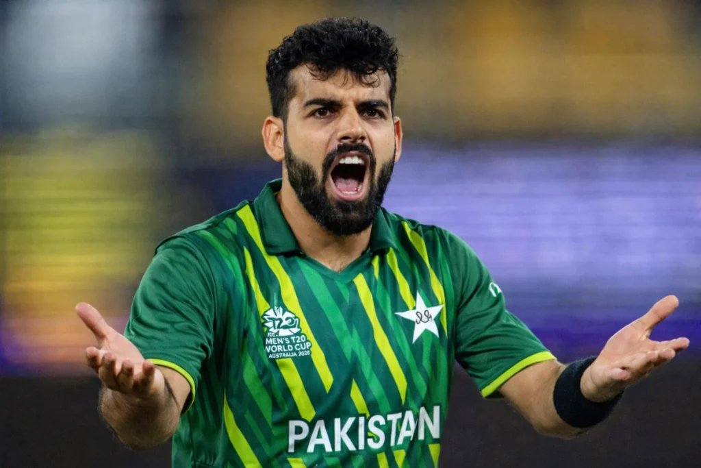 Pakistan all-rounder Shadab Khan reacting during a cricket match in Pakistan green jersey