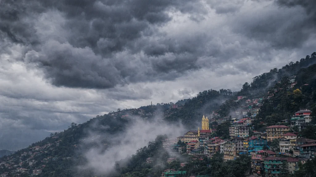 Dark storm clouds over Shimla hills as rain and snowfall forecast is issued for Himachal Pradesh.